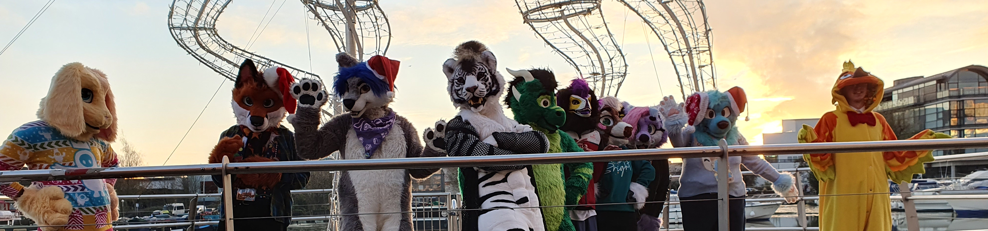 10 Furries  posing together at christmas fursuit walk